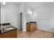 Bathroom featuring double vanities, granite countertops and tile floors at 3907 Voltaire Dr, Monroe, NC 28110