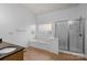 Bathroom featuring granite countertops, shower and bathtub at 3907 Voltaire Dr, Monroe, NC 28110