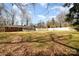 Expansive backyard features a well-maintained lawn and privacy fence at 401 Dakota St, Kannapolis, NC 28083