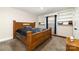 Cozy bedroom featuring a wooden bed frame, built-in shelves and ample storage space at 401 Dakota St, Kannapolis, NC 28083