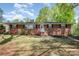 Charming brick home with landscaped front yard and inviting entrance, perfect for curb appeal at 401 Dakota St, Kannapolis, NC 28083
