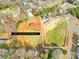 Aerial view highlighting the approximate 1.58-acre lot with potential building area at 4055 10Th Avenue Sw Dr, Hickory, NC 28602