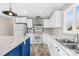 Beautiful kitchen design with stainless steel appliances, marbled countertops, and white cabinetry at 4055 10Th Avenue Sw Dr, Hickory, NC 28602