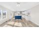 Modern kitchen with a central island, white cabinetry, and stainless steel appliances at 4055 10Th Avenue Sw Dr, Hickory, NC 28602