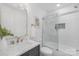 Stylish bathroom with glass shower, marble countertop vanity, and modern fixtures at 437 Chadmore Dr, Charlotte, NC 28270