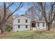 Charming white brick two-story home with newly landscaped yard at 437 Chadmore Dr, Charlotte, NC 28270