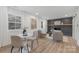 Cozy living room features a fireplace, hardwood floors, and natural light at 437 Chadmore Dr, Charlotte, NC 28270