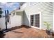 Cozy backyard featuring a stained patio, white privacy fence, and green exterior at 464 Hurston Cir, Charlotte, NC 28208