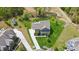 Aerial view of a beautiful home showcasing its well-manicured lawn, landscaping, and surrounding neighborhood at 5140 Oak Grove Pl, Waxhaw, NC 28173