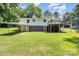Spacious two-story house with deck, carport and open backyard and partially finished basement at 5275 Long Ferry Rd, Salisbury, NC 28146