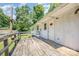 A spacious wooden deck offers an outdoor retreat, with a simple wooden railing and backyard views at 5275 Long Ferry Rd, Salisbury, NC 28146