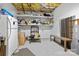 Unfinished basement with exposed ceiling, storage shelves, and ample space at 5309 Silchester Ln, Charlotte, NC 28215