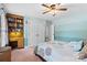 Bedroom with built-in desk, bookshelves, and large closet space at 5309 Silchester Ln, Charlotte, NC 28215
