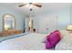 Bright bedroom with double closets and view into the hallway at 5309 Silchester Ln, Charlotte, NC 28215