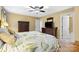 Inviting bedroom featuring a comfortable bed, wood furniture, and lots of space at 5309 Silchester Ln, Charlotte, NC 28215