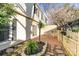 Beautifully landscaped backyard with a brick patio and ample space for outdoor enjoyment at 5909 Quail Hollow Rd # B, Charlotte, NC 28210