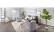 Open-concept living room features hardwood floors, modern decor, large windows, and ample light at 5909 Quail Hollow Rd # B, Charlotte, NC 28210