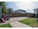 Backyard featuring concrete patio, a fenced yard, and plenty of room for entertaining at 615 E Sycamore St, Lincolnton, NC 28092