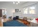 Play room area with hardwood floors, great lighting and ample space for a children to play at 615 E Sycamore St, Lincolnton, NC 28092