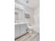 Well-lit bathroom with a modern vanity, bathtub, and updated fixtures at 617 Edinburgh Ct, Rock Hill, SC 29730