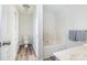 Bright bathroom with modern fixtures, vanity, bathtub, and wood-look flooring at 617 Edinburgh Ct, Rock Hill, SC 29730