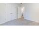 Bedroom with double door closet, neutral carpeting, and ample natural light at 617 Edinburgh Ct, Rock Hill, SC 29730