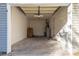 Clean, well-lit garage with concrete floor, utility sink, and plenty of space for parking and storage at 617 Edinburgh Ct, Rock Hill, SC 29730