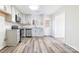 Bright kitchen with modern appliances and an adjacent entry door at 617 Edinburgh Ct, Rock Hill, SC 29730