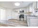 Well-lit kitchen featuring stainless steel appliances and white cabinets at 617 Edinburgh Ct, Rock Hill, SC 29730