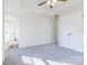 Spacious bedroom with neutral carpet, ceiling fan, and an ensuite bathroom at 617 Edinburgh Ct, Rock Hill, SC 29730