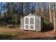 Backyard shed perfect for storing tools and equipment, with a double door entry at 617 Edinburgh Ct, Rock Hill, SC 29730