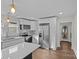 Bright, modern kitchen with stainless steel appliances and quartz countertops at 691 Gibson Nw Dr, Concord, NC 28025