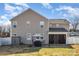 Large backyard with lawn, privacy fence, patio and gazebo area at 7436 Meridale Forest Dr, Charlotte, NC 28269