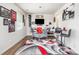 Modern bar area with stylish seating, a large television, and unique decor at 7436 Meridale Forest Dr, Charlotte, NC 28269