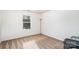 A simple bedroom with carpet, a window and neutral walls at 7436 Meridale Forest Dr, Charlotte, NC 28269