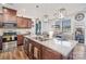 The kitchen features a large island, granite countertops, stainless steel appliances, and pendant lighting at 7436 Meridale Forest Dr, Charlotte, NC 28269