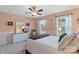 Charming bedroom features a dresser, neutral paint, and classic furniture, offering an inviting space at 7510 Plumcrest Ln, Harrisburg, NC 28075