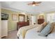 Bedroom features tray ceiling, neutral paint, and classic furniture, offering an inviting space at 7510 Plumcrest Ln, Harrisburg, NC 28075