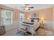Bedroom features soft hues, natural light, and stylish decor, creating a tranquil retreat at 7510 Plumcrest Ln, Harrisburg, NC 28075