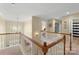 Spacious upstairs landing with natural light and views to the outdoors at 7510 Plumcrest Ln, Harrisburg, NC 28075