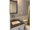 Cozy bathroom featuring a modern vanity and a shower with sliding glass doors at 9200 Joyce Kilmer Dr, Charlotte, NC 28213