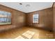 Inviting bedroom with hardwood floors and natural lighting from two windows at 9218 Robert Burns Ct, Charlotte, NC 28213