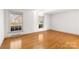 Bright bedroom with hardwood floors and natural light streaming through the windows at 9218 Robert Burns Ct, Charlotte, NC 28213