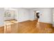 Inviting living room with hardwood floors, offering a flexible living space at 9218 Robert Burns Ct, Charlotte, NC 28213