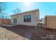 Fenced backyard with a patio, perfect outdoor space for relaxing, entertaining, and enjoying the scenery at 945 3Rd Street Sw Pl, Hickory, NC 28602