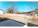 Large, level backyard with a wooden fence provides privacy and a concrete patio offers space for outdoor enjoyment at 945 3Rd Street Sw Pl, Hickory, NC 28602