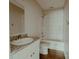 Stylish bathroom with granite counters, white cabinets, and modern tile shower-tub combination at 945 3Rd Street Sw Pl, Hickory, NC 28602