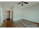 Well-lit bedroom offers new carpet, ceiling fan, and natural lighting at 945 3Rd Street Sw Pl, Hickory, NC 28602