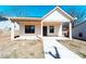 New construction featuring white siding, a covered porch with craftsman columns, and a concrete walkway at 945 3Rd Street Sw Pl, Hickory, NC 28602