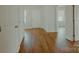 Bright hallway with sleek floors, fresh paint, and convenient access to different living spaces at 945 3Rd Street Sw Pl, Hickory, NC 28602